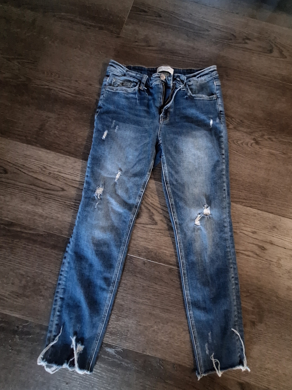 Worn-In Distressed Ankle Jeans in Blue